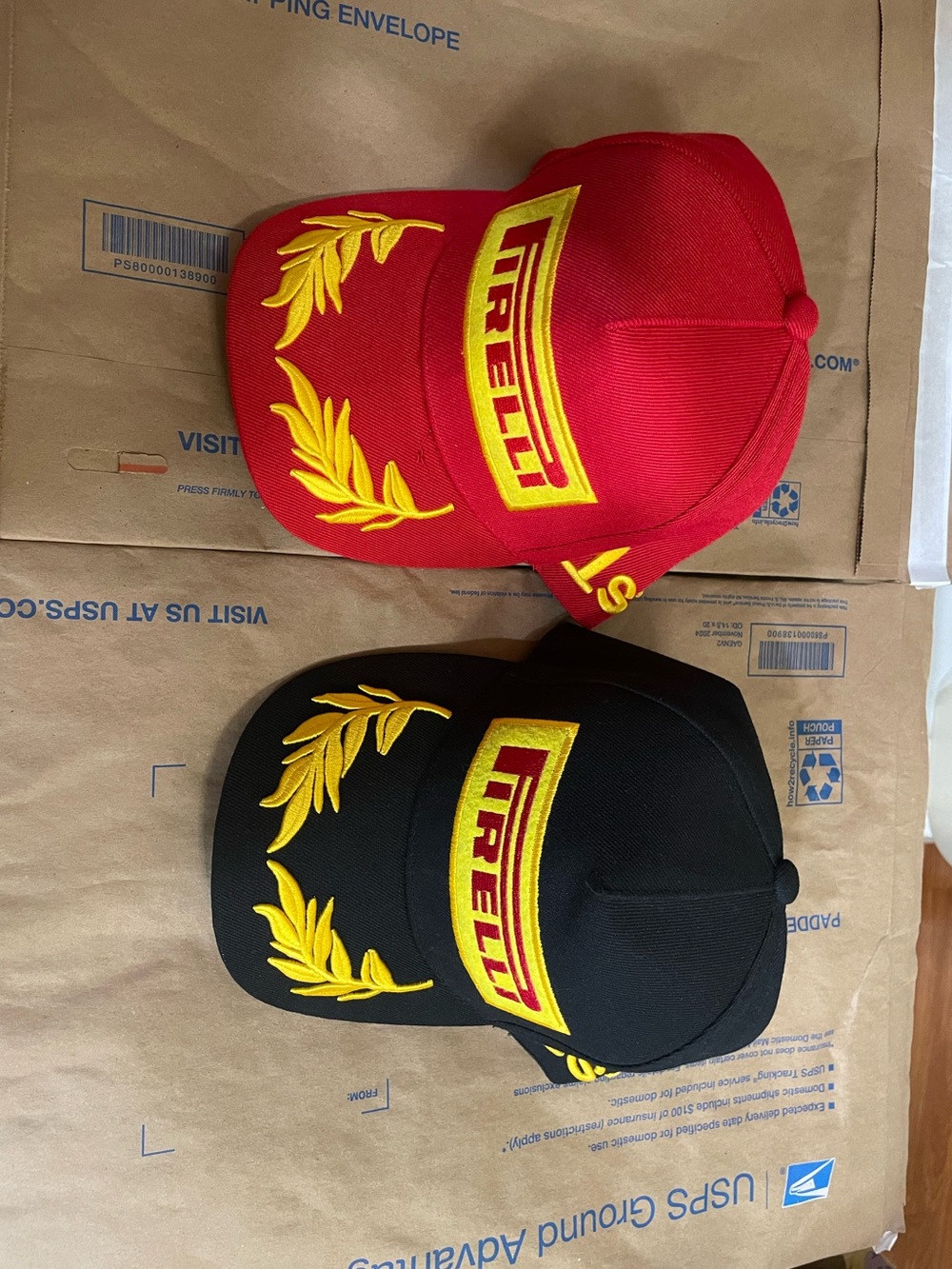 2 Pirelli Hats One Black w/Gold The Other Red w/Gold Embroidery 1st Place Velcro